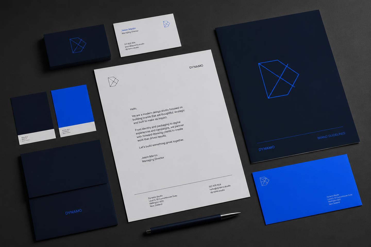 Brand identity materials including business cards, letterhead and colour swatches